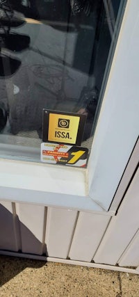 a sign in the window of a store