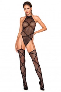 a woman wearing a black fishnet bodystocking and stockings