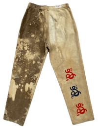 a pair of pants with stains on them