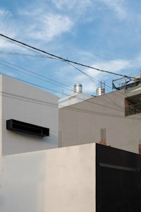 a building with a black and white facade