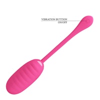 a pink sex toy with a pink handle