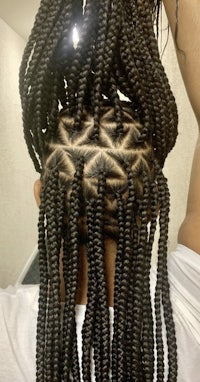 a woman with braids in her hair