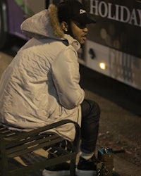 a man sitting on a bench