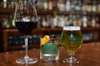 a glass of wine and a glass of beer