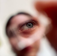 a blurry image of a woman's eye