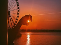 a ferris wheel in the background