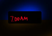 a clock with the word '7am' on it