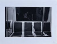 a black and white photograph of a subway car