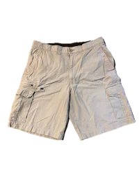 a pair of men's cargo shorts on a black background