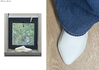 a pair of white shoes next to a window