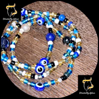 a blue and gold beaded bracelet with evil eye beads