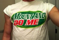 a man wearing a t - shirt that says mountain do me