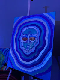 a blue painting on a wall