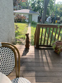 a chair on a wooden deck