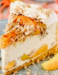 a slice of peach cheesecake on a plate