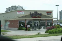 a picture of a restaurant on the corner of a street