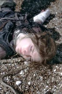 a woman laying on the ground