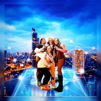 a group of people posing for a picture in front of a city