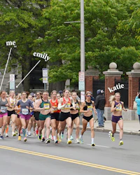 a group of women running in a race