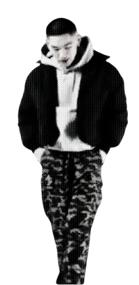 a black and white image of a man in a hoodie and pants