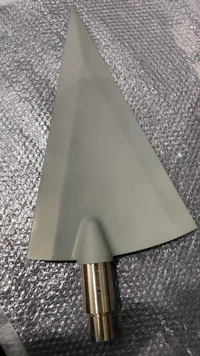 a metal triangle on a piece of cloth