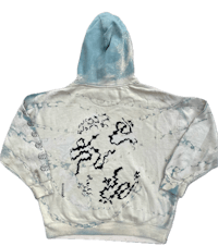 a white hoodie with a blue design on it
