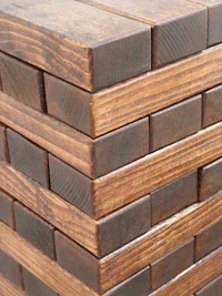 a stack of wooden blocks stacked on top of each other