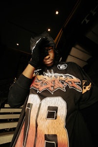 a man wearing a black t - shirt
