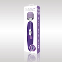 a blue and purple electric shaver in its packaging