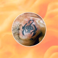 a man with a scorpion tattoo on his chest