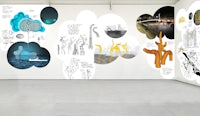 a room with drawings on the wall