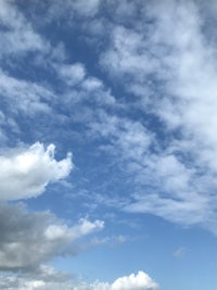 a blue sky with white clouds