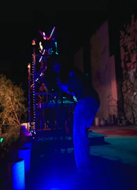 a person standing on a stage at night
