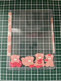 a piece of paper with a sticker on it