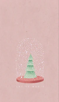 a snow globe with a christmas tree in it