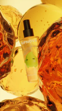 a bottle of orange juice with a bottle in the background