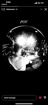 a black and white photo of a person with a microphone