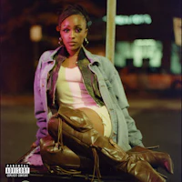 a woman is sitting on a bench