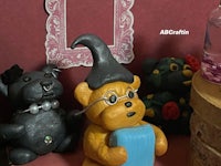 a group of teddy bears on a shelf