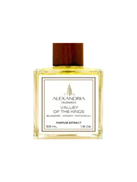 a bottle of oil with a black background