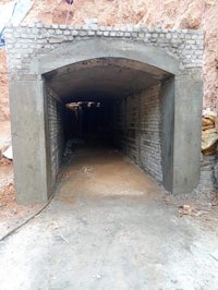 a tunnel is being built in a mountain area