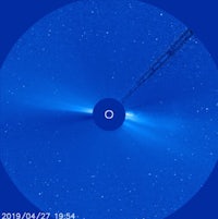 an image of a comet with a blue background