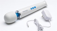 a white electric massager on a white surface