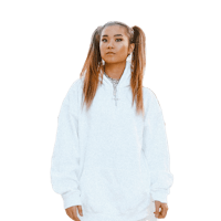 a woman wearing a white hoodie and white pants