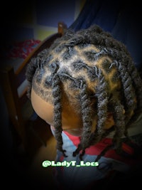 a child's hair with dreadlocks on it