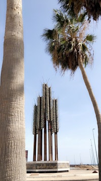 a statue of a palm tree