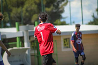 a group of people playing a game of soccer