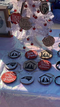a table full of christmas ornaments on a table