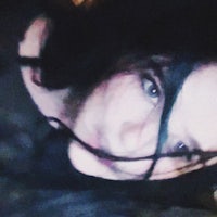 a close up of a woman's face