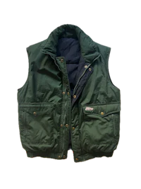 a green vest on a black background